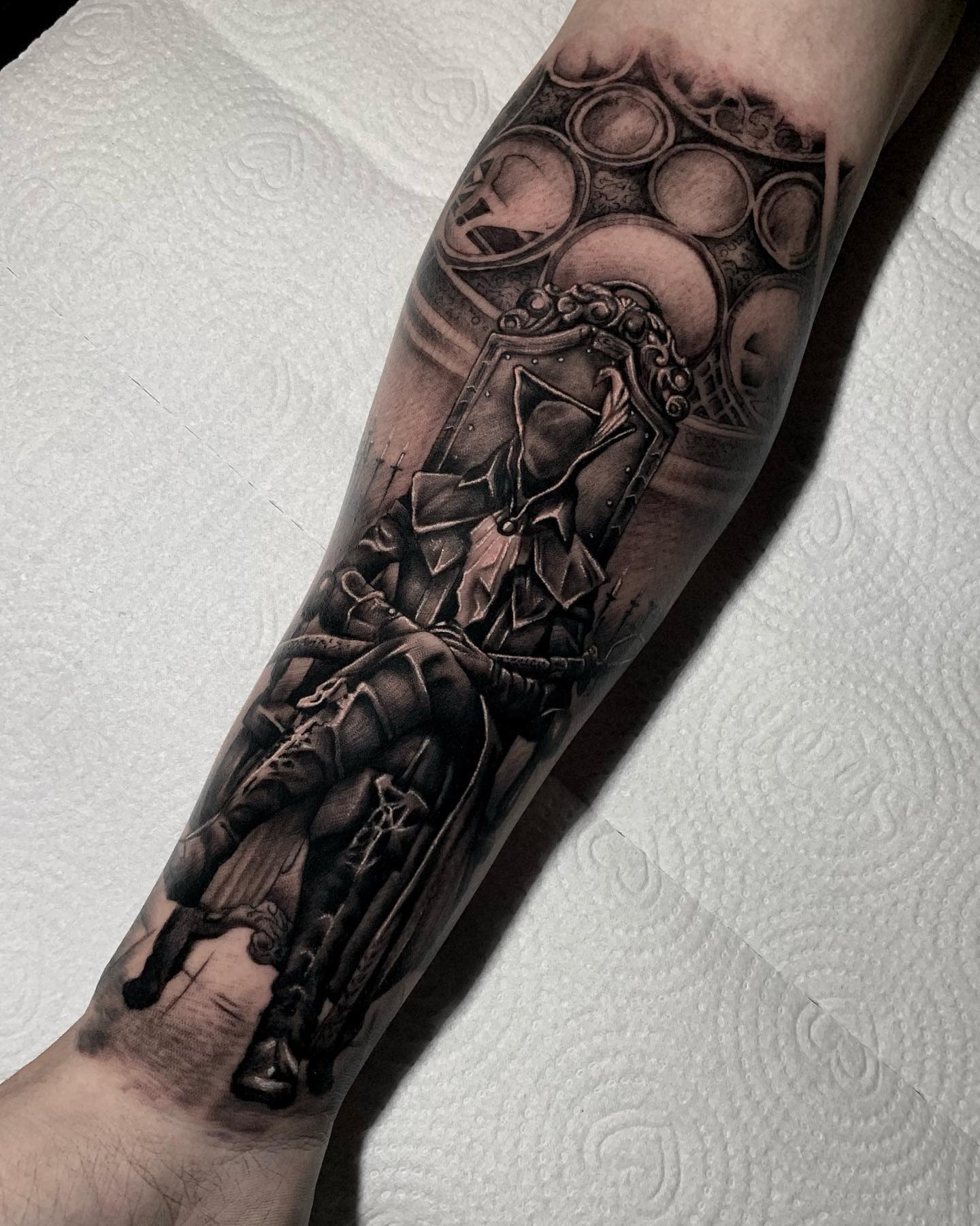 Detailed tattoo of Lady Maria seated on a gothic throne with ornate designs